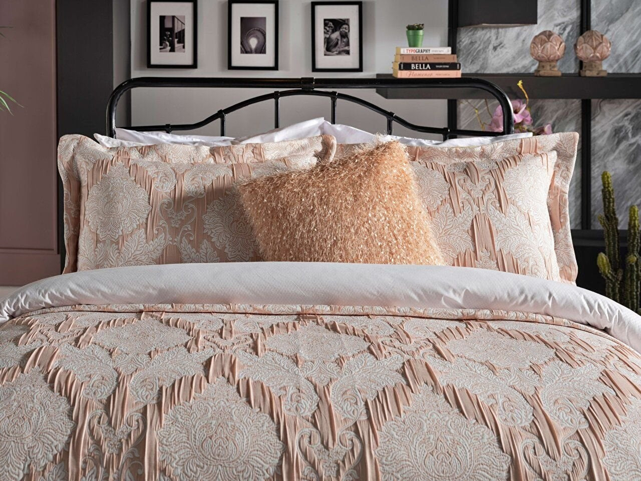 Light pink bedspread set in king size, including a bed cover and two pillowcases.
