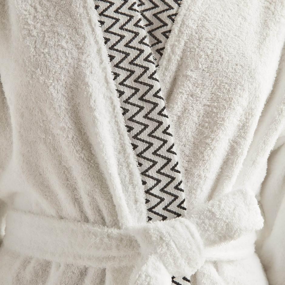 White bathrobe made from 100% cotton, suitable for both men and women.