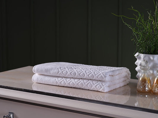 Luxury Bath Towel - Indulge in the ultimate comfort and style with our luxurious bath towel. Made from premium materials, this towel offers exceptional softness, absorbency, and durability. Elevate your bathing experience with this high-quality, plush towel.