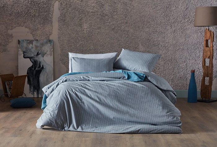 Gray duvet cover set in queen size, including a duvet cover, standard sheet, and two pillowcases.