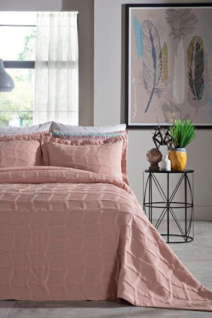Pink bedspread set in king size, including a bed cover and two pillowcases.