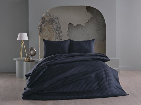 Black duvet cover set in queen size, including a duvet cover, standard sheet, and two pillowcases.
