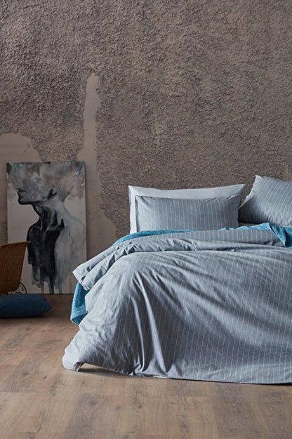 Gray duvet cover set in queen size, including a duvet cover, standard sheet, and two pillowcases.